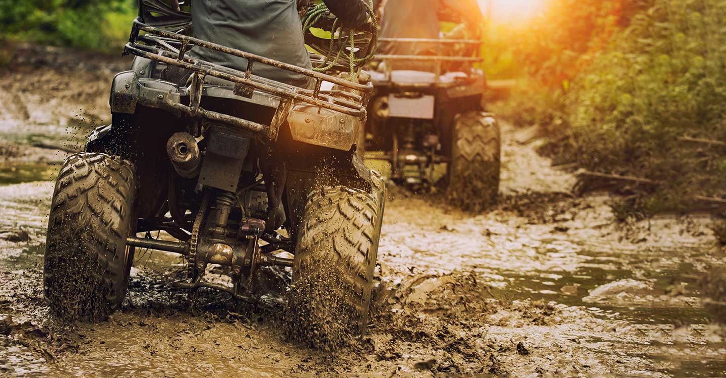 ATVs riding mud